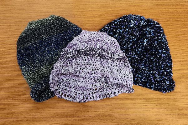 assorted hand knitted caps
