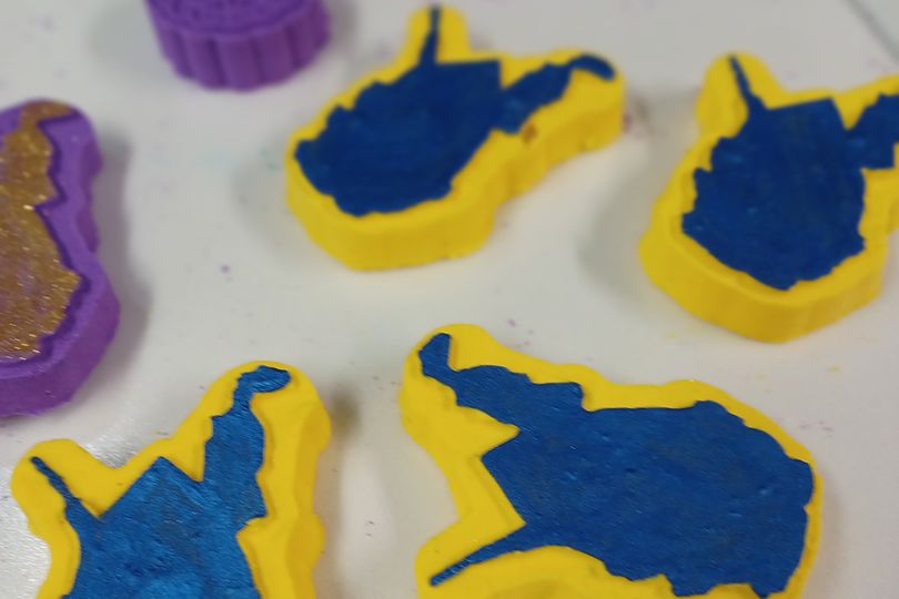 handmade soap bars in the shape of the State of West Virginia