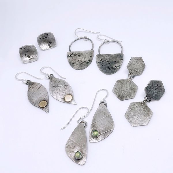 hand forged sterling silver and gold earrings