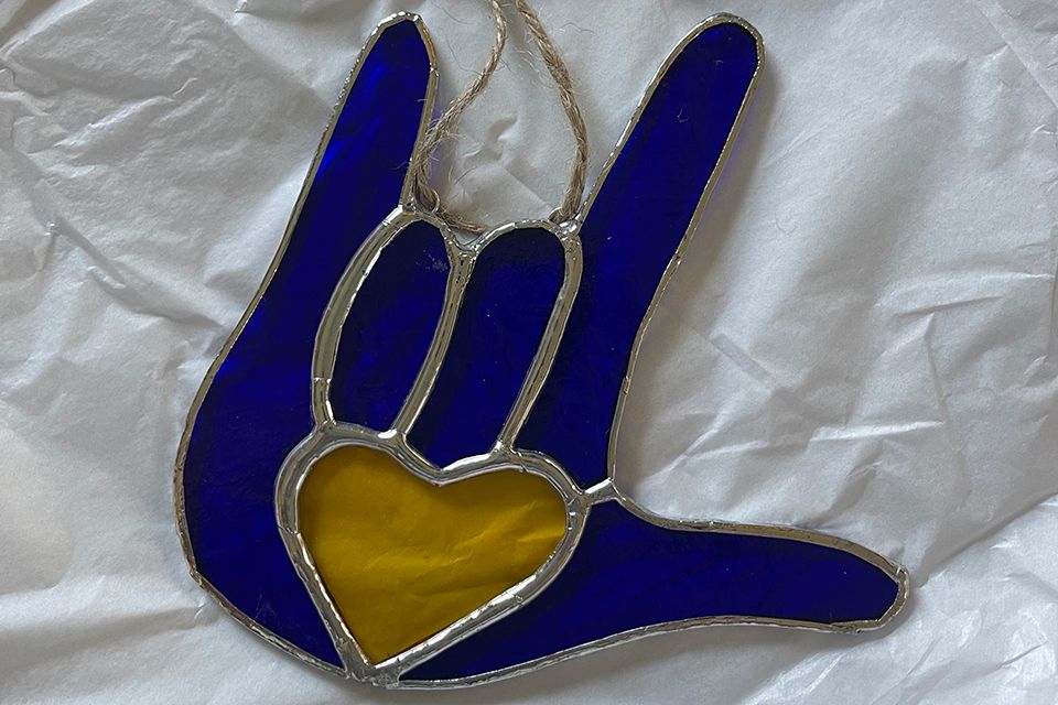 ASL I Love You ornament made in blue and gold stained glass
