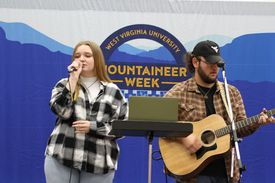 Lexi Mank and Dalton Matheny singing in the food court during Mountaineer Week