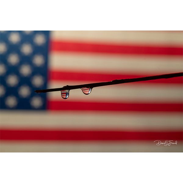two water drops in front of the American flag