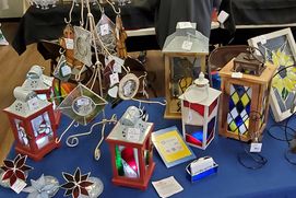 Various lanterns, suncatchers and ornaments made of glass